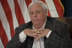 Justice tightens mask mandate, suspends winter sports and more as COVID worsens